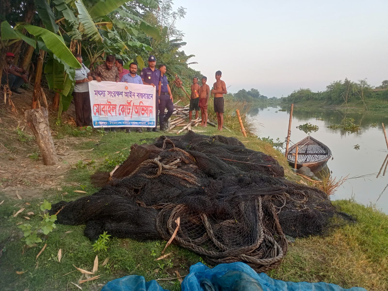 বাগমারায় নদী থেকে অবৈধ জাল উদ্ধার, ধ্বংস